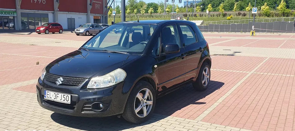 samochody osobowe Suzuki SX4 cena 12700 przebieg: 276000, rok produkcji 2009 z Łódź